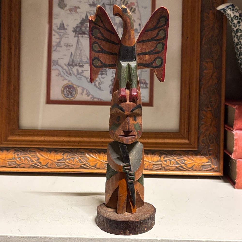 Alaskan hand-carved and hand painted wooden totem pole figure